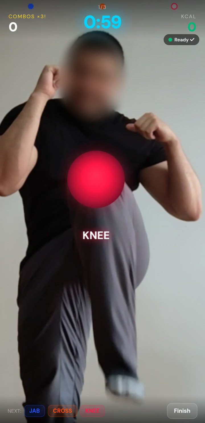 A knee rising into the target on screen
